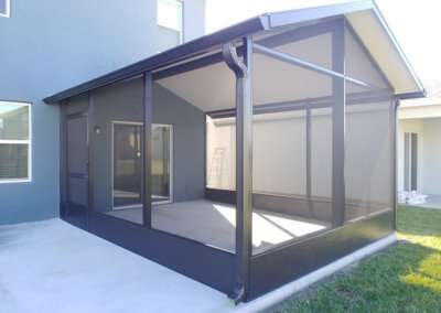 screen enclosure with additional concrete patio