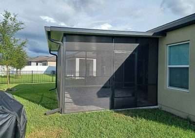 New Smyrna Beach patio enclosure with insulated roof - side view2