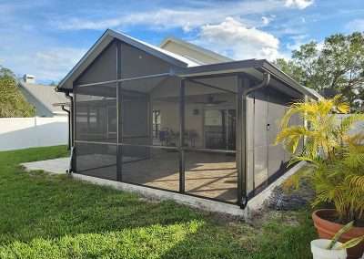 Oviedo screen room with pavers - back view
