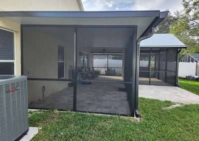 Oviedo screen room with pavers - side view