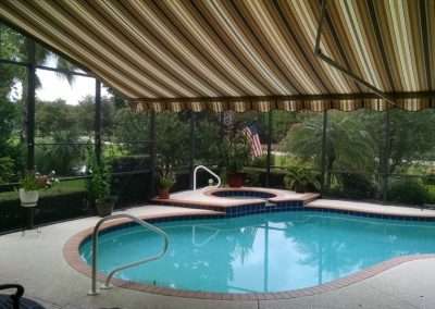 retractable awning inside pool enclosure