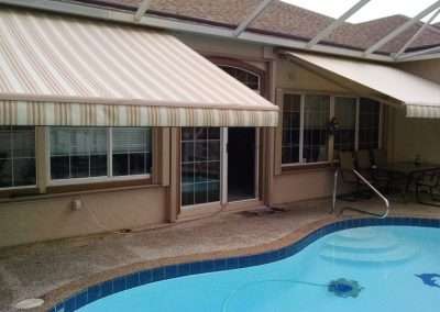 retractable awning inside pool enclosure
