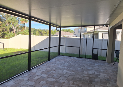 Pavers, screened in room, and a pet door!